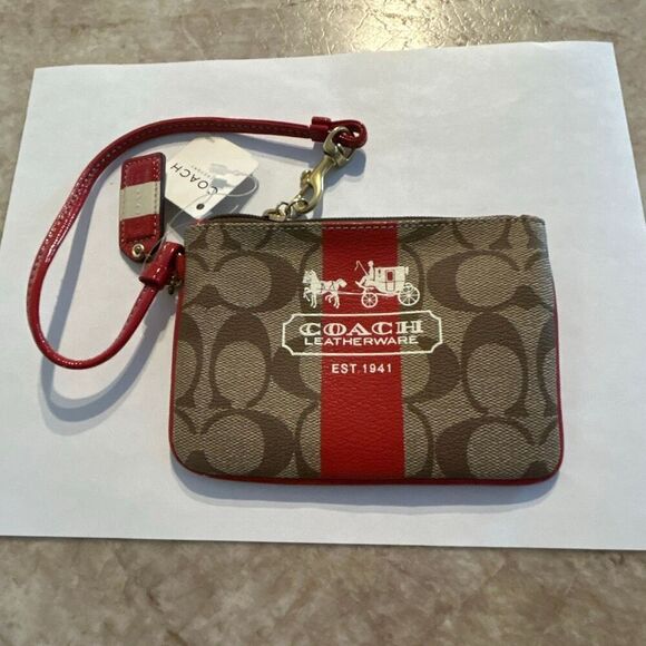 Coach Handbags - COACH Signature Print Wristlet NWT